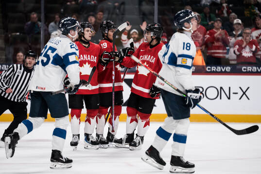 Gavin McKenna, Zayne Parekh and Sam O'Reilly of Canada