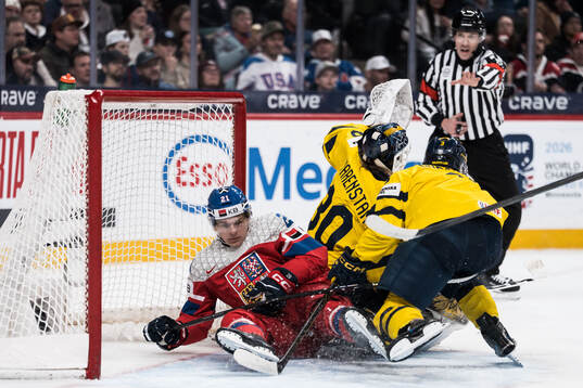Jiri Klima of Czech Republic and goaltender Love Härenstam