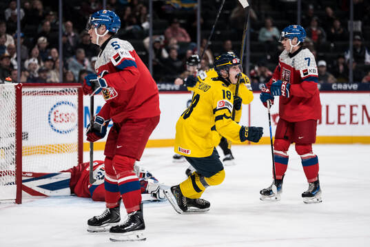 Victor Eklund of Sweden celebrates