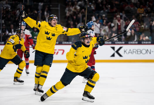 Jack Berglund and Victor Eklund of Sweden celebrate