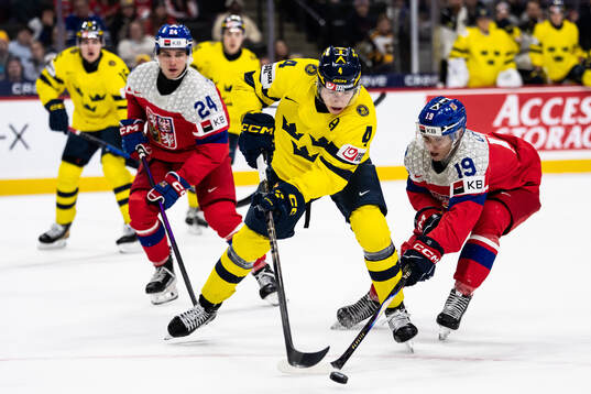 Adam Novotny and Danny Chludil of Czech Republic and Leo