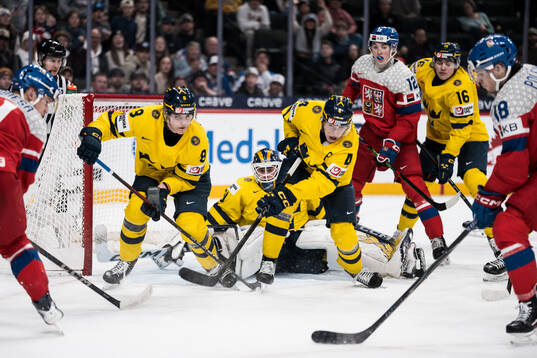 Felix Carell, goaltender Love Härenstam and Leo Sahlin
