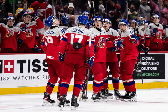 Matej Kubiesa of Czech Republic celebrate with teammates