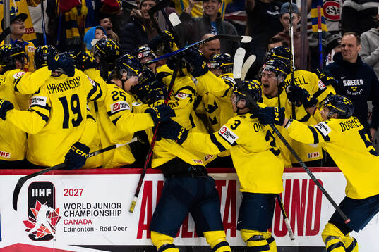 Players of Sweden celebrate