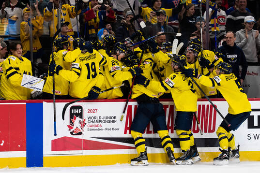 Players of Sweden celebrate