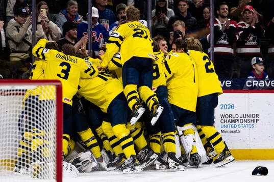 Players of Sweden celebrate