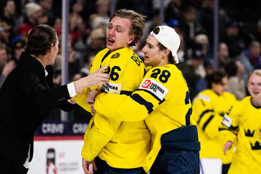 Jack Berglund and Eric Nilson of Sweden celebrate