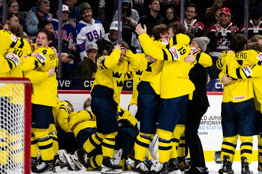 Players of Sweden celebrate