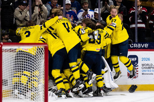 Players of Sweden celebrate