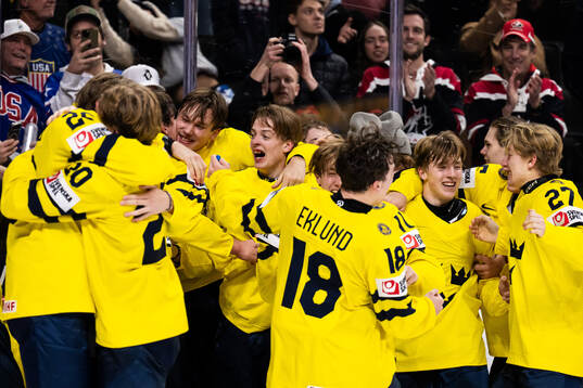 Players of Sweden celebrate