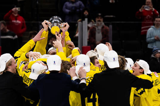 Players of Sweden celebrate