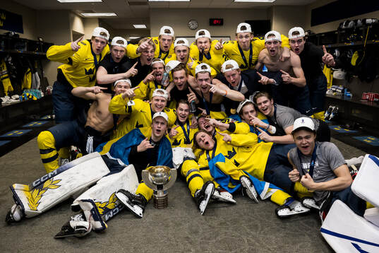 Players of Sweden celebrate