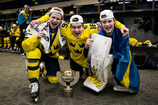 Alfons Freij, Anton Frondell, and goaltender Love