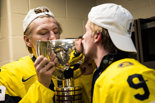 Jack Berglund and Victor Johansson of Sweden celebrate