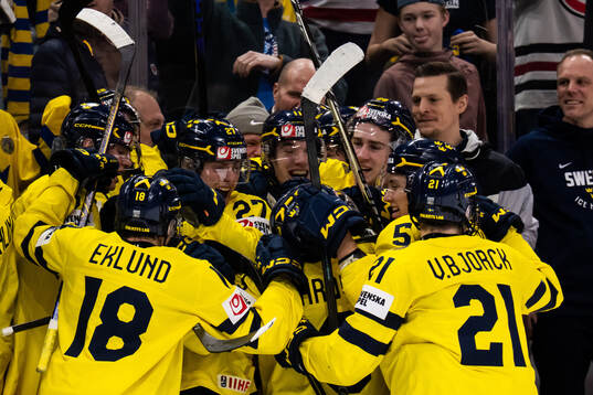 Players of Sweden celebrate