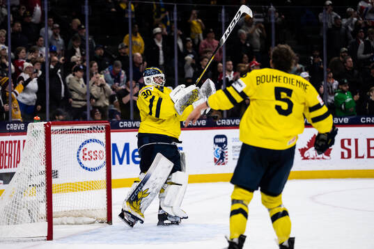 Goaltender Love Härenstam and Sascha Boumedienne of Sweden