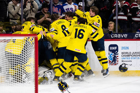 Players of Sweden celebrate