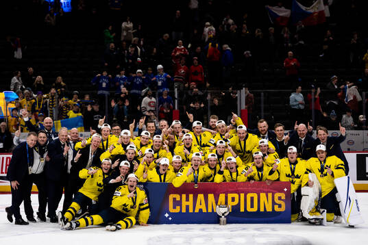 Players of Sweden celebrate