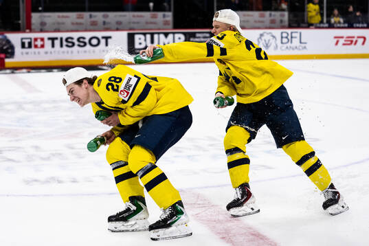 Eric Nilson and Liam Danielsson of Sweden celebrate