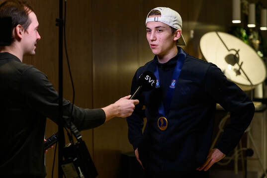 Victor Eklund of Sweden speaks to media