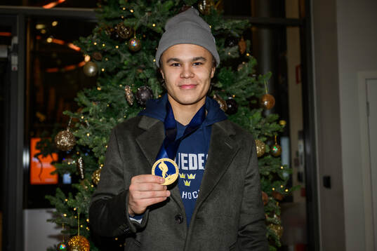 goaltender Herman Liv of Sweden poses for a photo with his