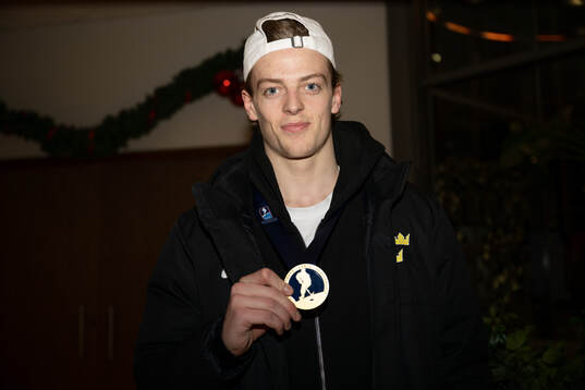 Loke Krantz of Sweden poses for a photo with his gold medal