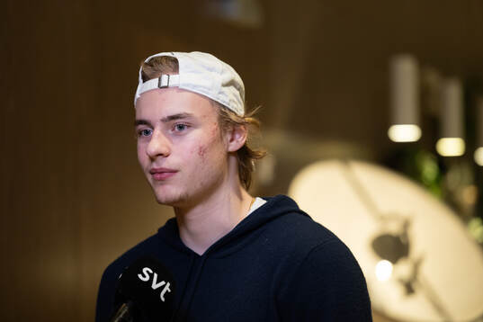 Goaltender Love Härenstam of Sweden is interviewed as he