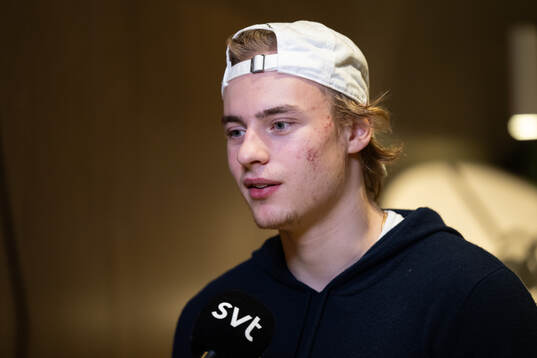 Goaltender Love Härenstam of Sweden is interviewed as he