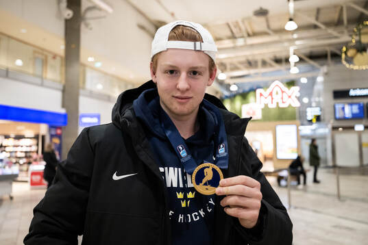 Viggo Gustafsson of Sweden poses for a photo with his gold