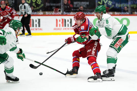 Timrås Simon Forsmark och Rögles Linus Sandin