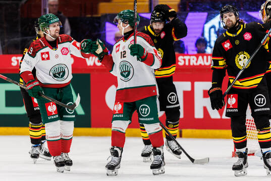 Linus Weissbach and Max Friberg of Frölunda celebrate