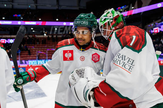 Max Westergård and goaltender Lars Johansson of Frölunda