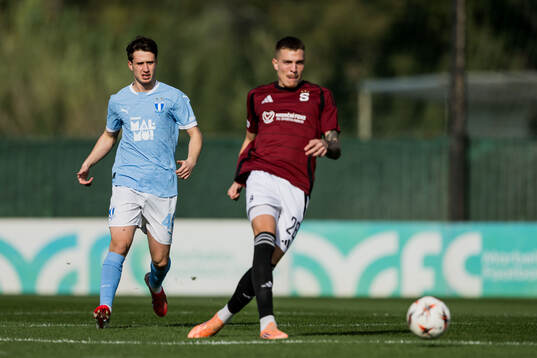 Kenan Busuladzic of Malmö FF and Patrik Vydra of Sparta