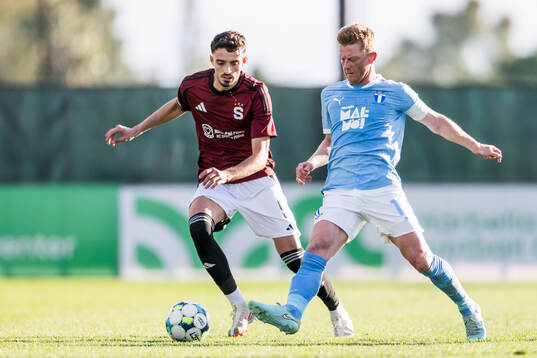 Albion Rrahmani of Sparta Prag and Anders Christiansen of
