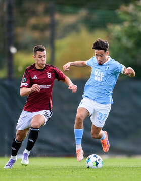 Hugo Sochurek of Sparta Prag and Adrian Skogmar of Malmö FF