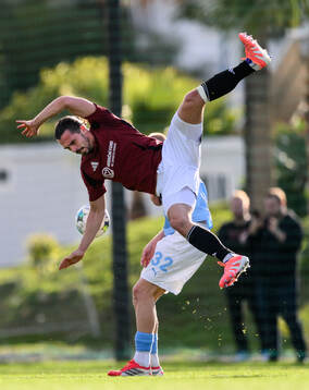 Jakub Martinec of Sparta Prag and Daniel Gudjohnsen of