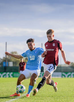 Adrian Skogmar of Malmö FF and Filip Panak of Sparta Prag