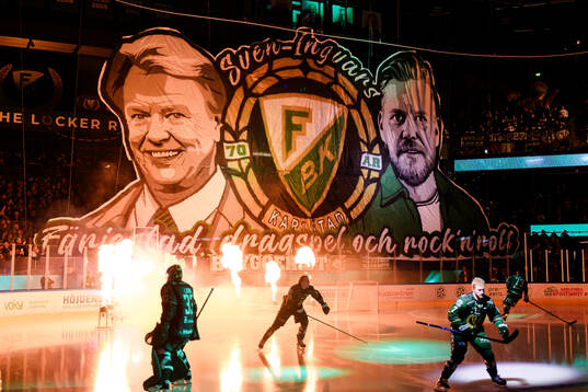 Tifo med bild på Sven-Erik Magnusson och sonen Oscar