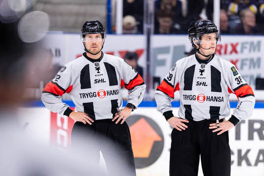 domare Andreas Harnebring och Domare Marcus Wannerstedt