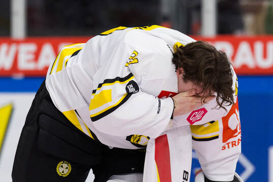 Goaltender Erik Källgren of Brynäs in pain