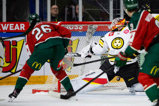 Isac Heens of Frölunda scores 2-2 past goaltender Erik