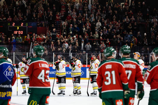 Players of Brynäs look dejected