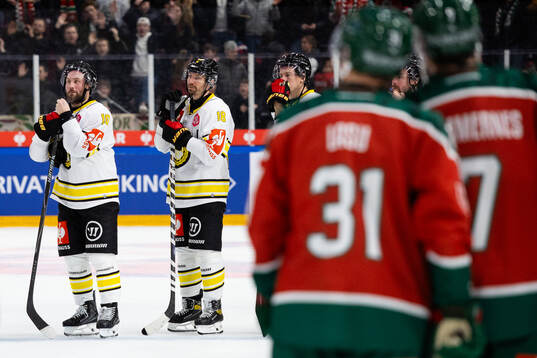 Johan Larsson and Anton Rödin of Brynäs look dejected