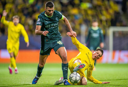 Rodri of Manchester City and Sondre Brunstad Fet of