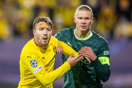 Fredrik André Bjørkan of Bodø/Glimt and Erling Braut