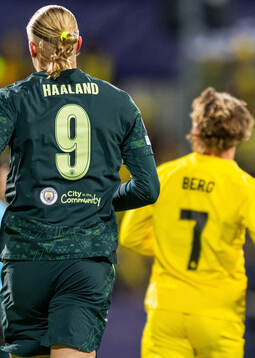 Erling Braut Haaland of Manchester City and Patrick Berg of