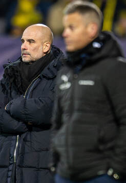 Head coach Pep Guardiola of Manchester City and head coach