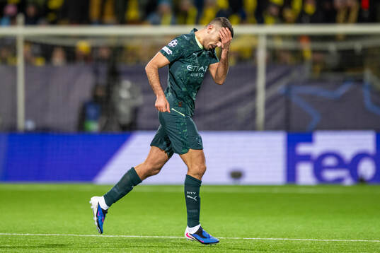Rodri of Manchester City looks dejected