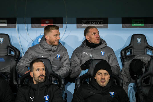 Anders Christiansen and goalkeeper Robin Olsen of Malmö FF