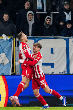 Vladimir Lucic and Vasilije Kostov of Crvena Zvezda